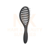 A black paddle-style hairbrush with a matte finish and flexible bristles, shown against a white background with a faint 'NK Hair & Beauty Supplies' watermark.