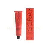Schwarzkopf Professional Igora Royal hair color tube in a vibrant coral-red shade next to its matching retail box, displayed on a clean white background.