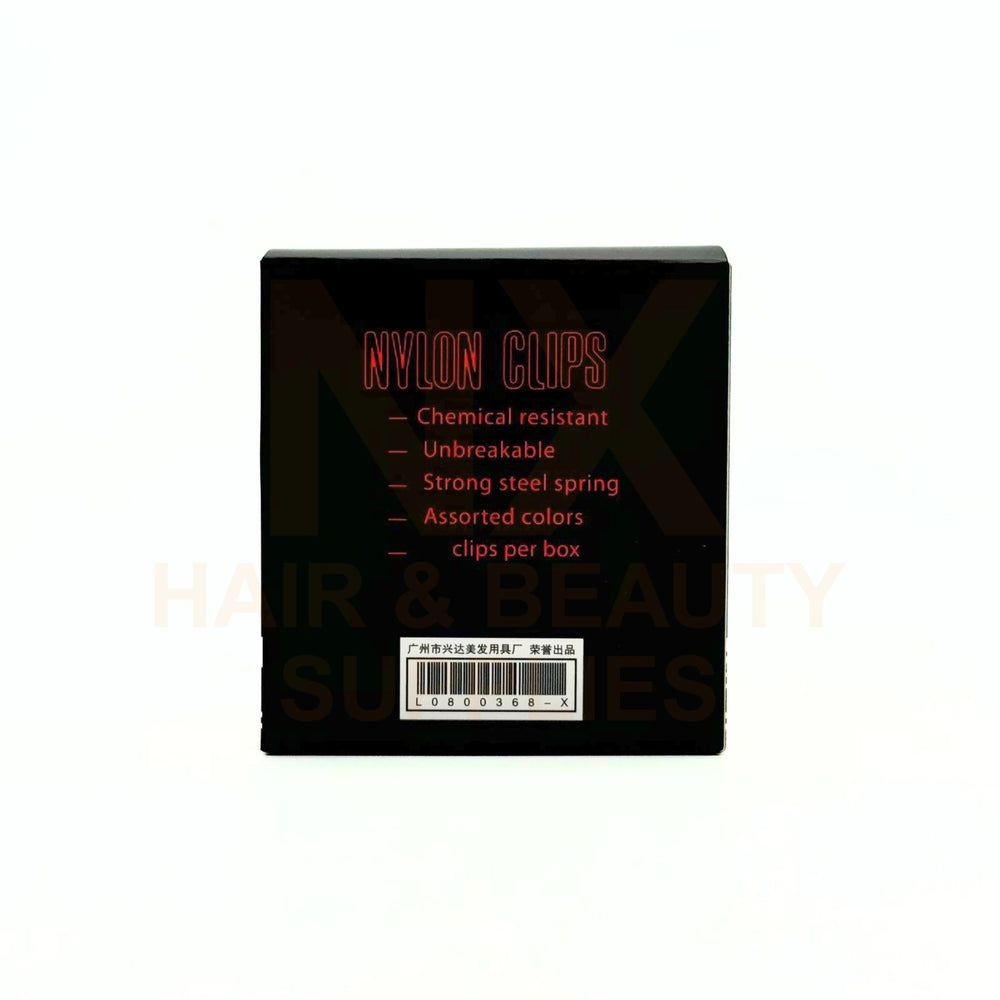 A black rectangular product box for nylon hair clips, featuring red text and a barcode on a white background.